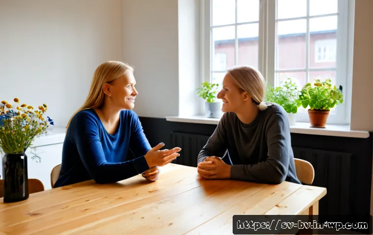 Home 13 상대방을 존중하는 커뮤니케이션 방법 - Photorealistic candid scene in a bright Swedish home kitchen, two adult friends seated across a wood...